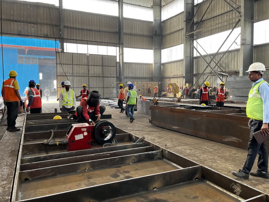 Team in the fabrication shed